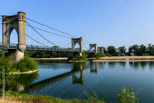 view of the langeais bridge, the river and its surroundings