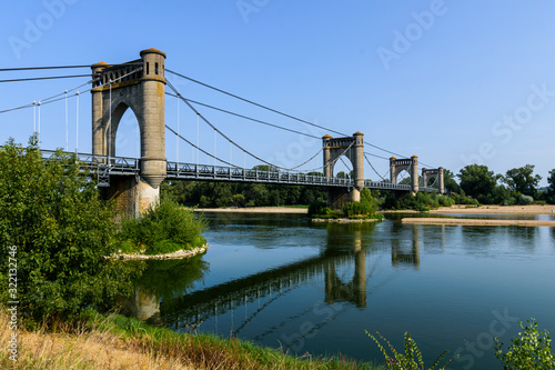 view of the langeais bridge, the river and its surroundings