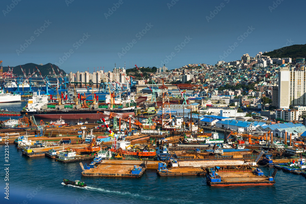 South Korea, Yeongnam Region, Busan, Port of Busan with view of tug boat moorings at Yeongdo Island.