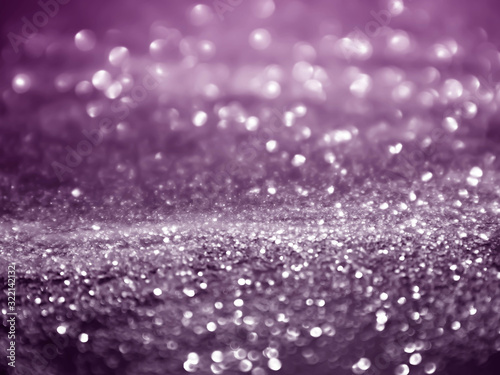 Defocused Background With Blinking Stars. purple Blurred Bokeh.