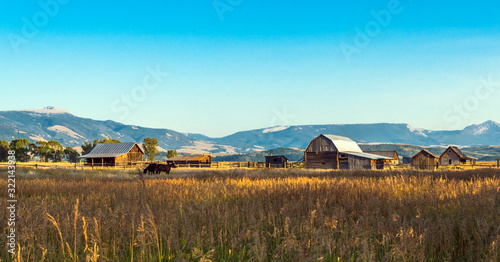 Sunset at Mormon Row Historic District in Grand Teton National Park, WY, USA photo