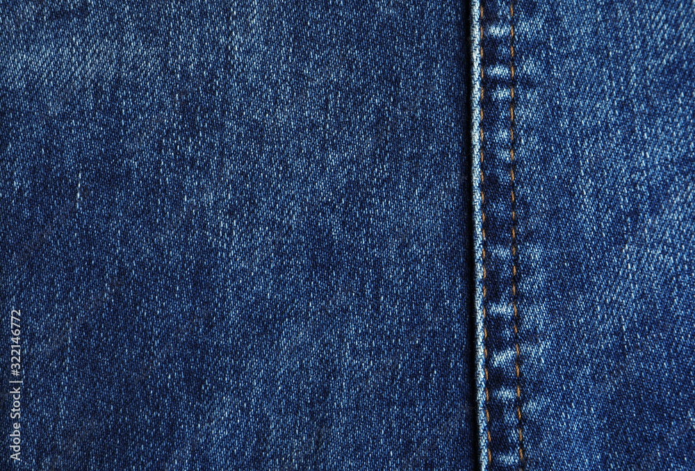 Texture of dark blue jeans as background, closeup Texture of dark blue jeans as background, closeup