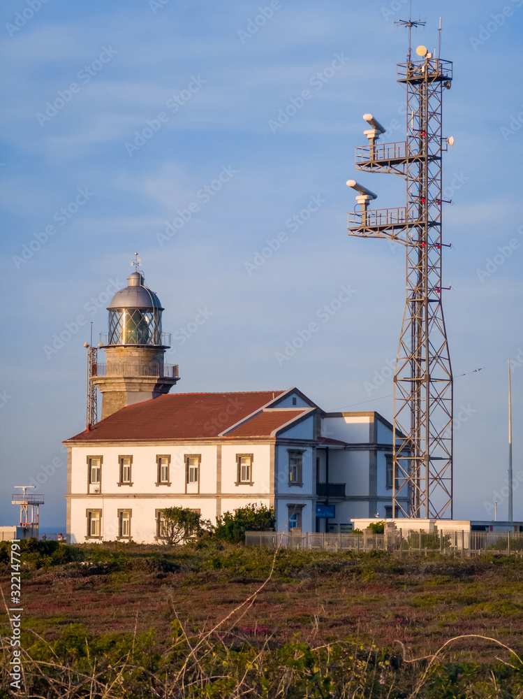 Lighthouse on the coast and communications and radar antenna in Cabo Peñas. Asturias. Spain