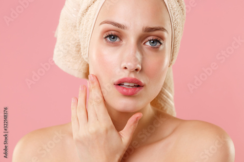 Close up blonde half naked woman 20s perfect skin nude make up blue eyes isolated on pastel pink wall background studio portrait. Skin care healthcare cosmetic procedures concept. Mock up copy space.