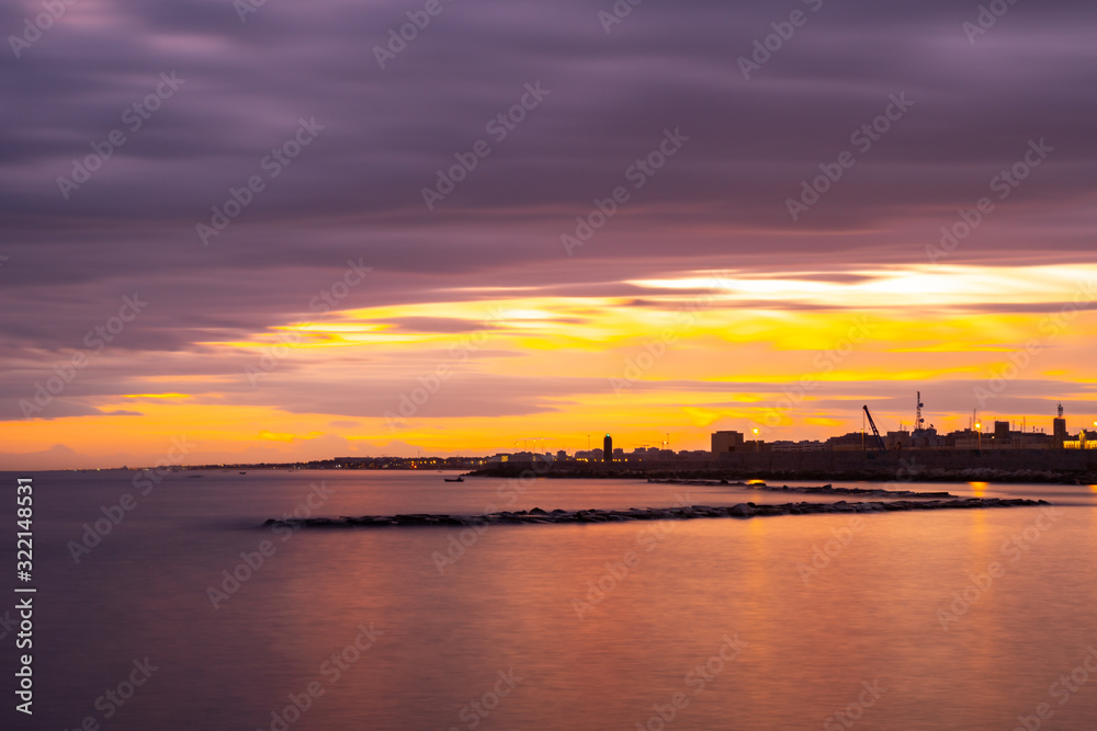 Beautiful sunset on the coast of Bari, Adriatic Sea.