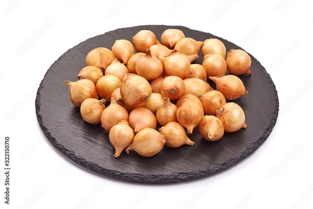 Young onion bulbs, isolated on white background Young onion bulbs, isolated on white background