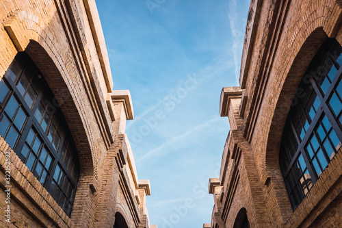 Old brick industrial buildings renovated for social uses of the city in Valencia, Spain.