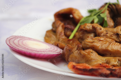 Slika na platnu onions and meat on a plate