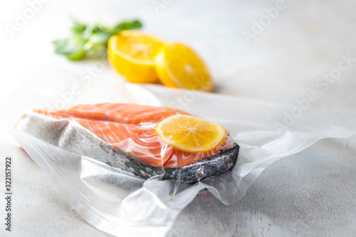 Salmon fillets in a vacuum package. Sous-vide, new technology cuisine.