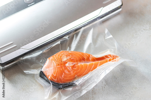 Salmon fillets in a vacuum package. Sous-vide, new technology cuisine.