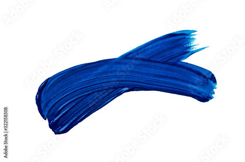 Photo of classic blue paint stroke on white background. stroke paint. copy space