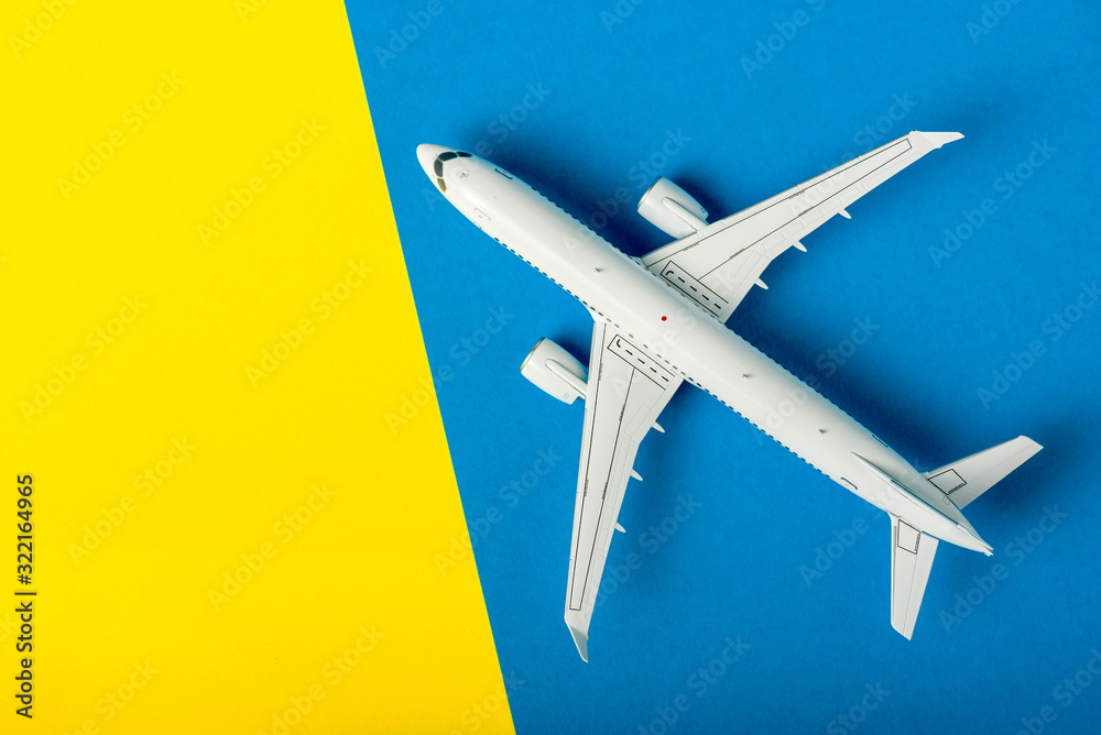 Airplane toy model. Top view of a big passenger or cargo aircraft, business jet, airline with copy space. Transportation, travel concept