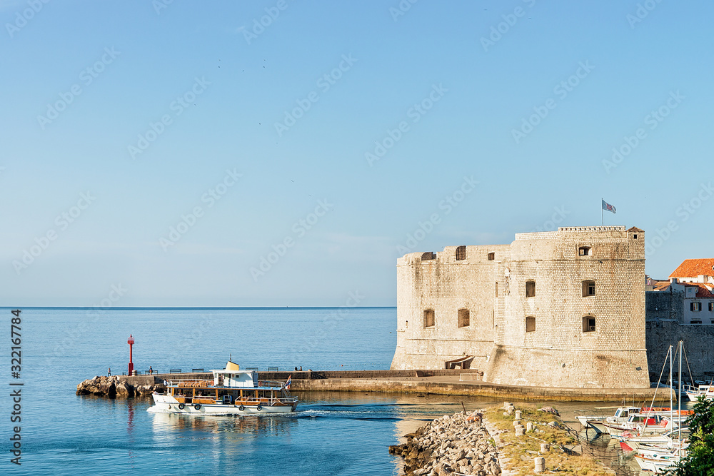 Saint John Fortress and boats in Old port in Dubrovnik