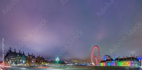 London Skyline at night with London Eye, Westminster Bridge, River Thames, London, England, UK.