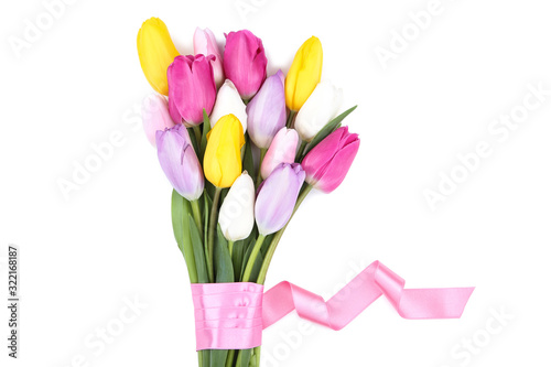Bouquet of tulip flowers with ribbon on white background