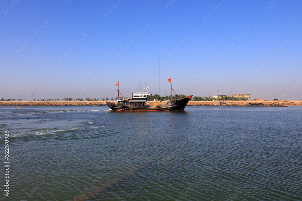 Fishing boats moored at fishing port wharf, Luannan County, Hebei Province, China
