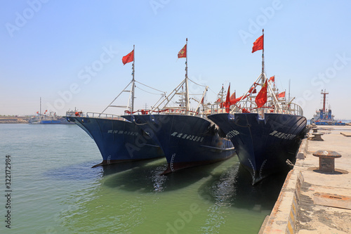 Fishing boats moored at fishing port wharf, Luannan County, Hebei Province, China