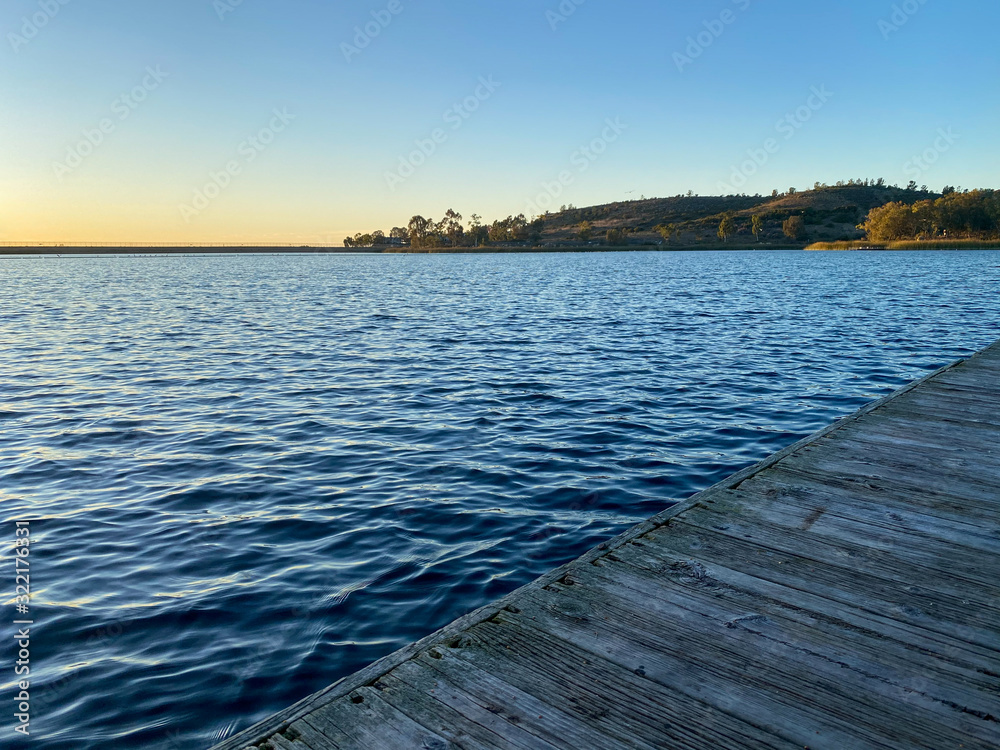 little wood pier at Miramar lake before sunset twilight. San Diego, California, USA.