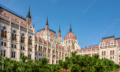 Budapest / Hungary - August 29 2019:Hungarian Parliament building in the city of Budapest. A sample of neo-gothic architecture, Budapest's tourist attraction