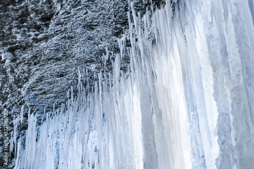 ice curtain under a frozen waterfall
