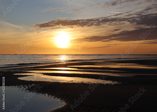 sunset on the beach © Jonathan