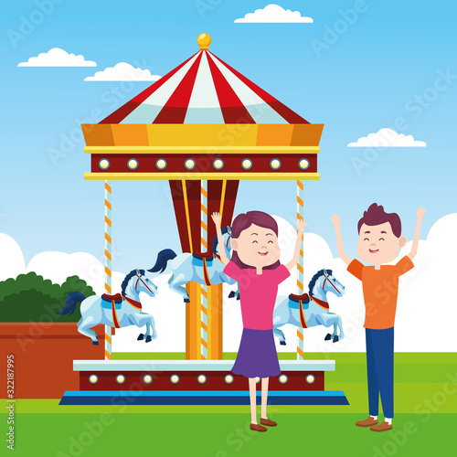 Happy couple and fair horses carousel over landscape background