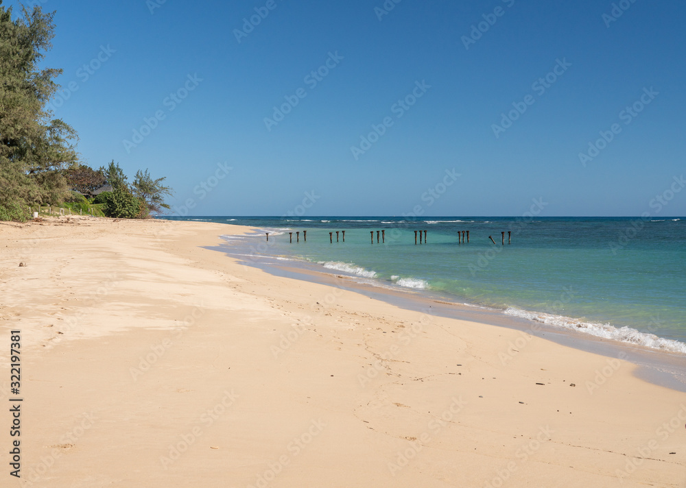 Deserted sandy beach known as Pounders at La'ei beach park on east coast of Oahu in Hawaii
