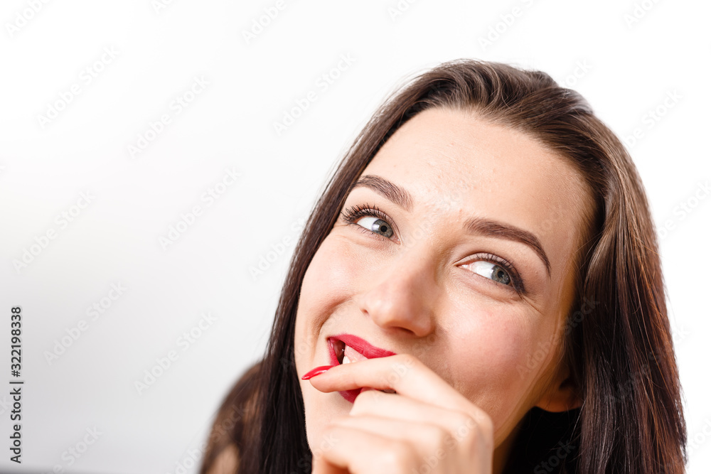 Business young beautiful lady on a white background shows different emotions copy space Business young beautiful lady on a white background shows different emotions copy space