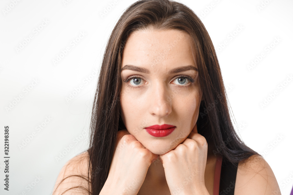 Business young beautiful lady on a white background shows different emotions copy space Business young beautiful lady on a white background shows different emotions copy space