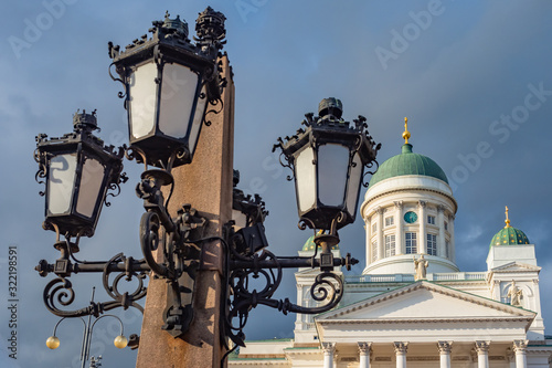Helsinki. Finland St. Nicholas Cathedral. Lantern on the background of the Suurkirkko temple. Orthodox Church in Helsinki. Architecture of Finnish cities. Traveling in Finland. European Union