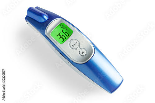 infrared thermometer for monitoring temperature with a indication of 36.6 on the display, close-up. healthcare and epidemic control concept