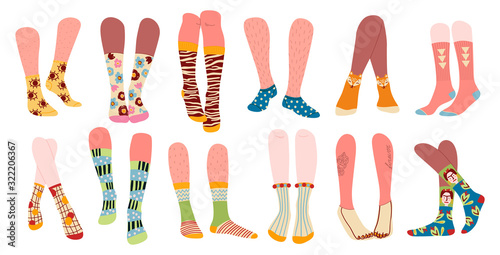 Collection of stylish and funny socks with different textures isolated on white background.