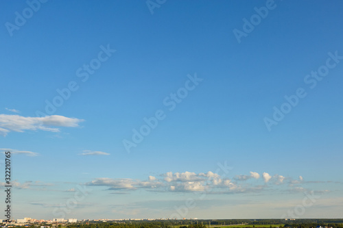 Blue aerial landscape on light background. Empty background scene. Panoramic view. Sky blue background. Urban scene. Sunny day, blue sky. Wide angle. Wide panorama. Aerial view. Sky clouds.