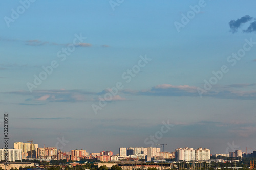 Blue aerial landscape on light background. Empty background scene. Panoramic view. Sky blue background. Urban scene. Sunny day, blue sky. Wide angle. Wide panorama. Aerial view. Sky clouds. © Maksim