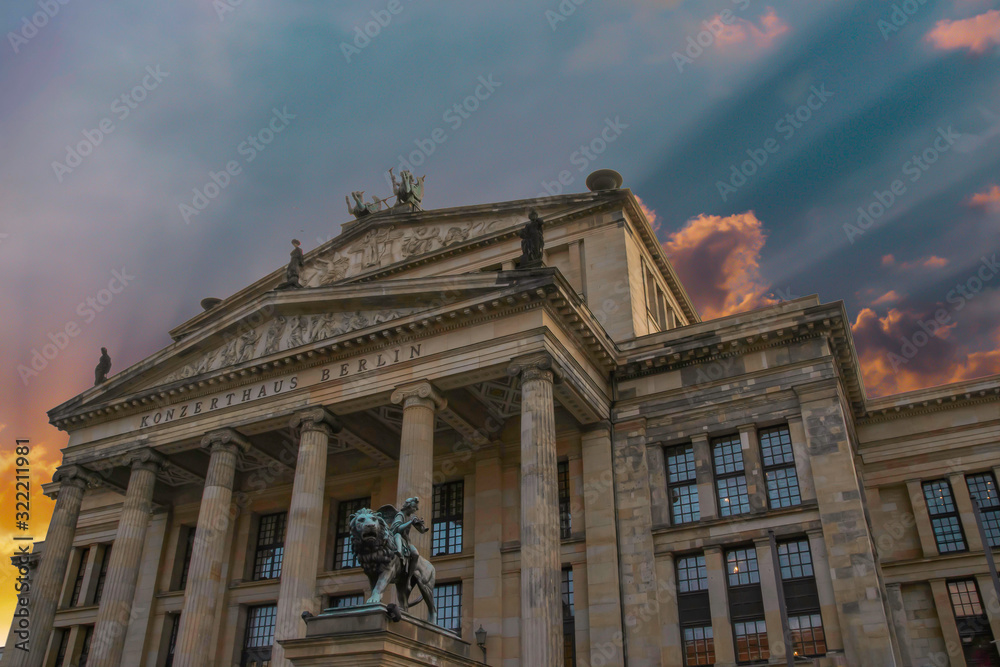 Front view of Konzerthaus, Berlin with dramatic sunset sky, nobody