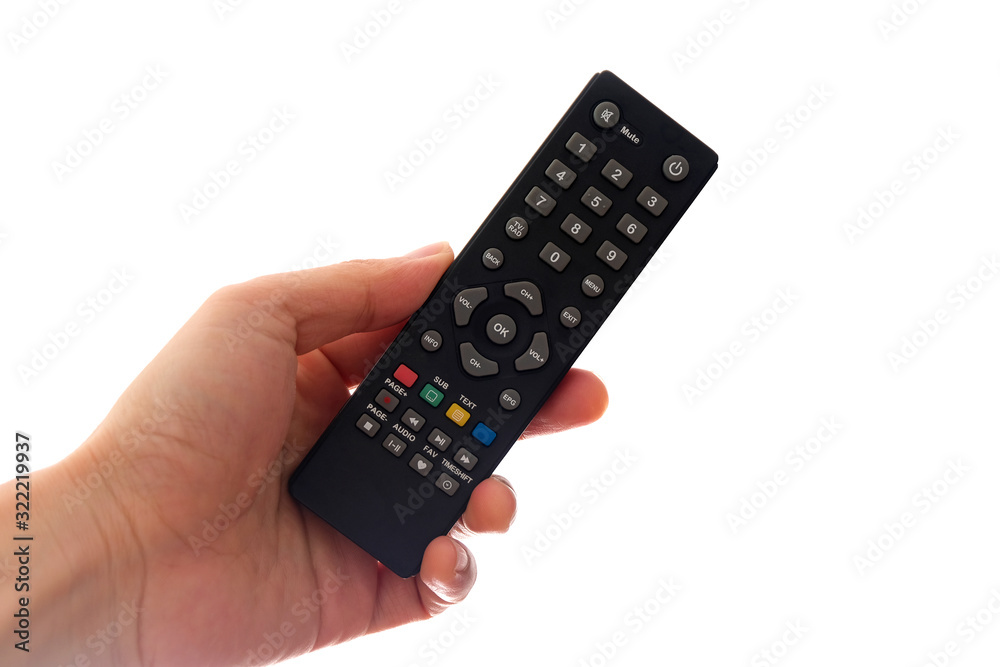 His hand is holding the remote control and operate the remote control. on the White Background . Concept of Technology His hand is holding the remote control and operate the remote control. on the White Background . Concept of Technology