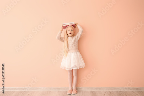 Surprised little girl with ...