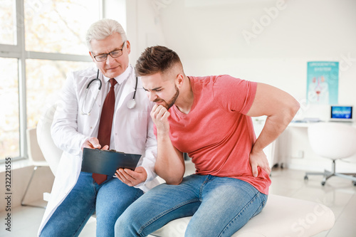 Young man visiting urologis...