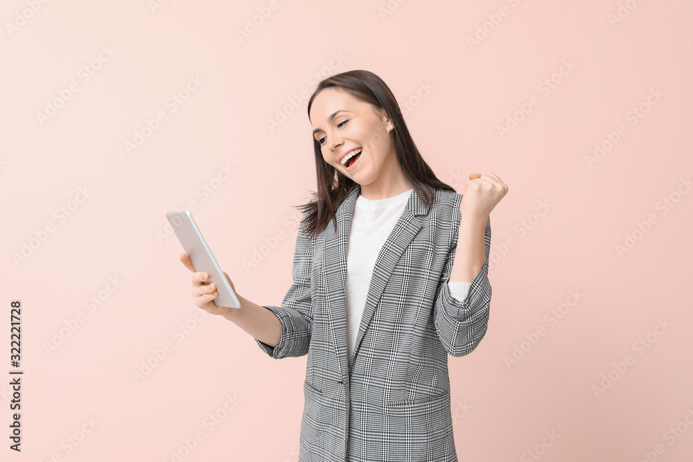 Happy businesswoman with tablet computer on color background Happy businesswoman with tablet computer on color background