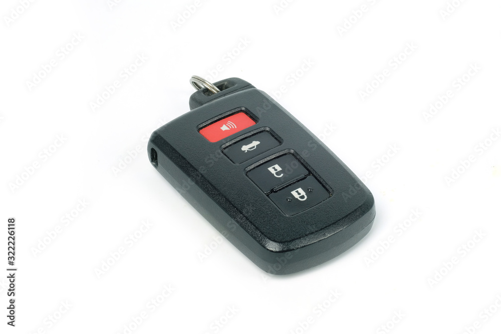 Car key with remote control isolated over white background Car key with remote control isolated over white background
