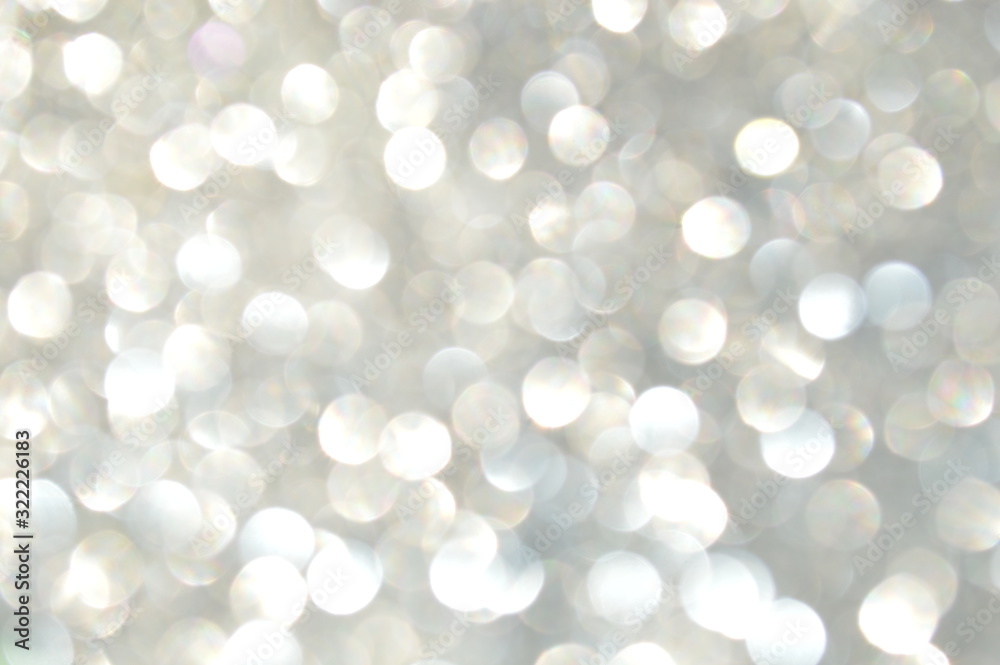 Bokeh of bright glittering sheet with shining sunlight Bokeh of bright glittering sheet with shining sunlight