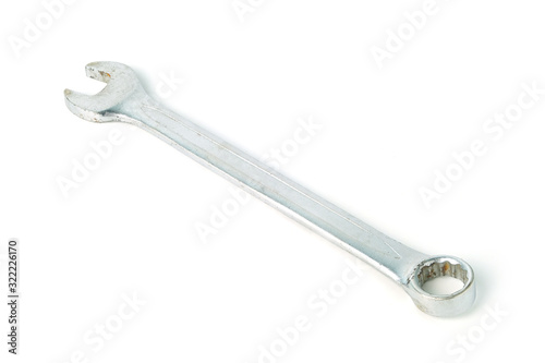 Separate wrench on white background. Side view. © DECHA