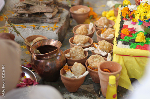 indian pooja prayer traditional culture with jaggery and flowers