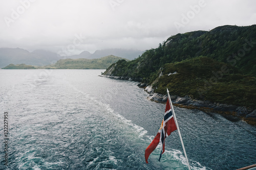 Norwegian flag in fjord 