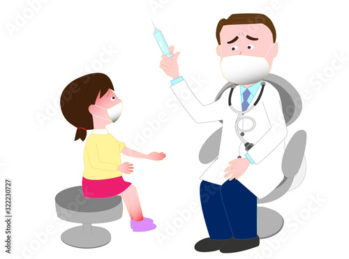 発熱している子供の患者を治療している医師。