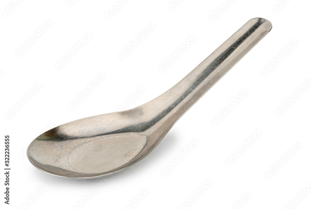 Old silver spoon isolated on white background with clipping path. Old silver spoon isolated on white background with clipping path.