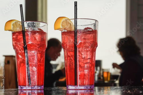 Baltimore, Maryland, USA Pink lemonade and straws in a restaurant. photo