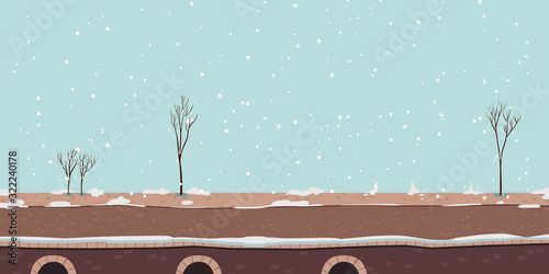 Winter river promenade or bridge with bare trees and snow