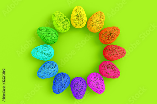 Easter concept. On a green background, a lot of eggs are woven from a lot of intertwined colored bright threads laid out in a circle with an empty space in the center . 3D stock illustration.