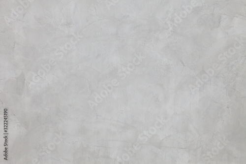 Grey cement wall with rustic natural texture for abstract background and design purpose 